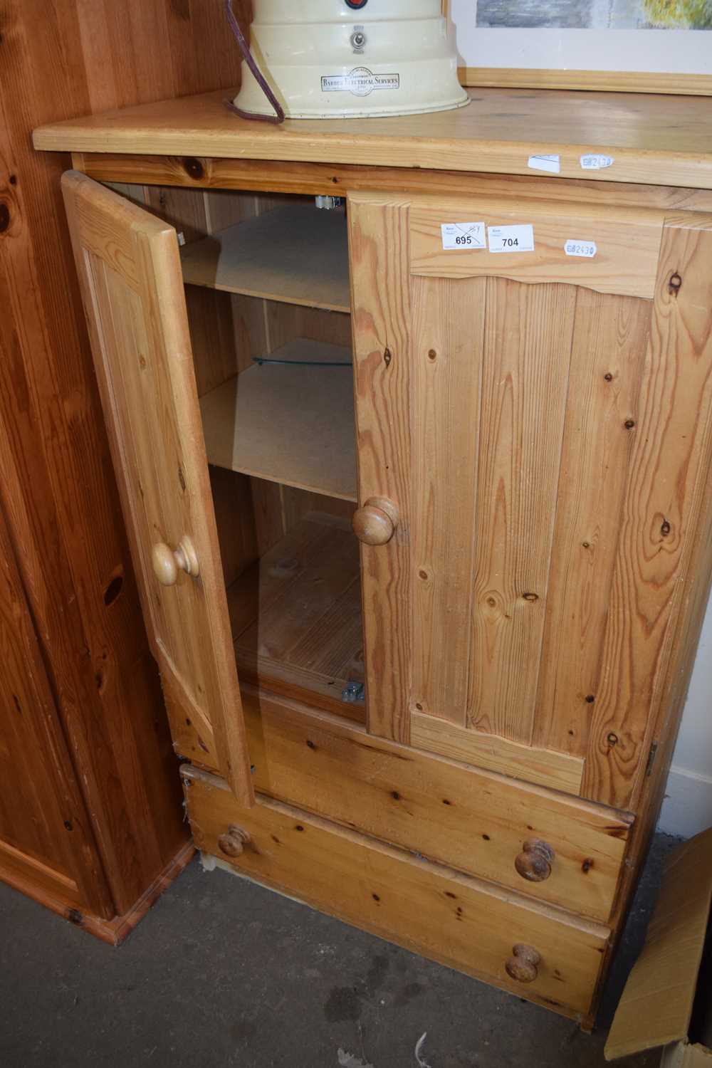 Pine cupboard with two drawers below, 73cm wide