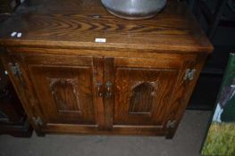 Stained pine side cupboard with two doors