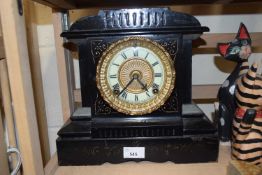 Late Victorian iron cased mantel clock