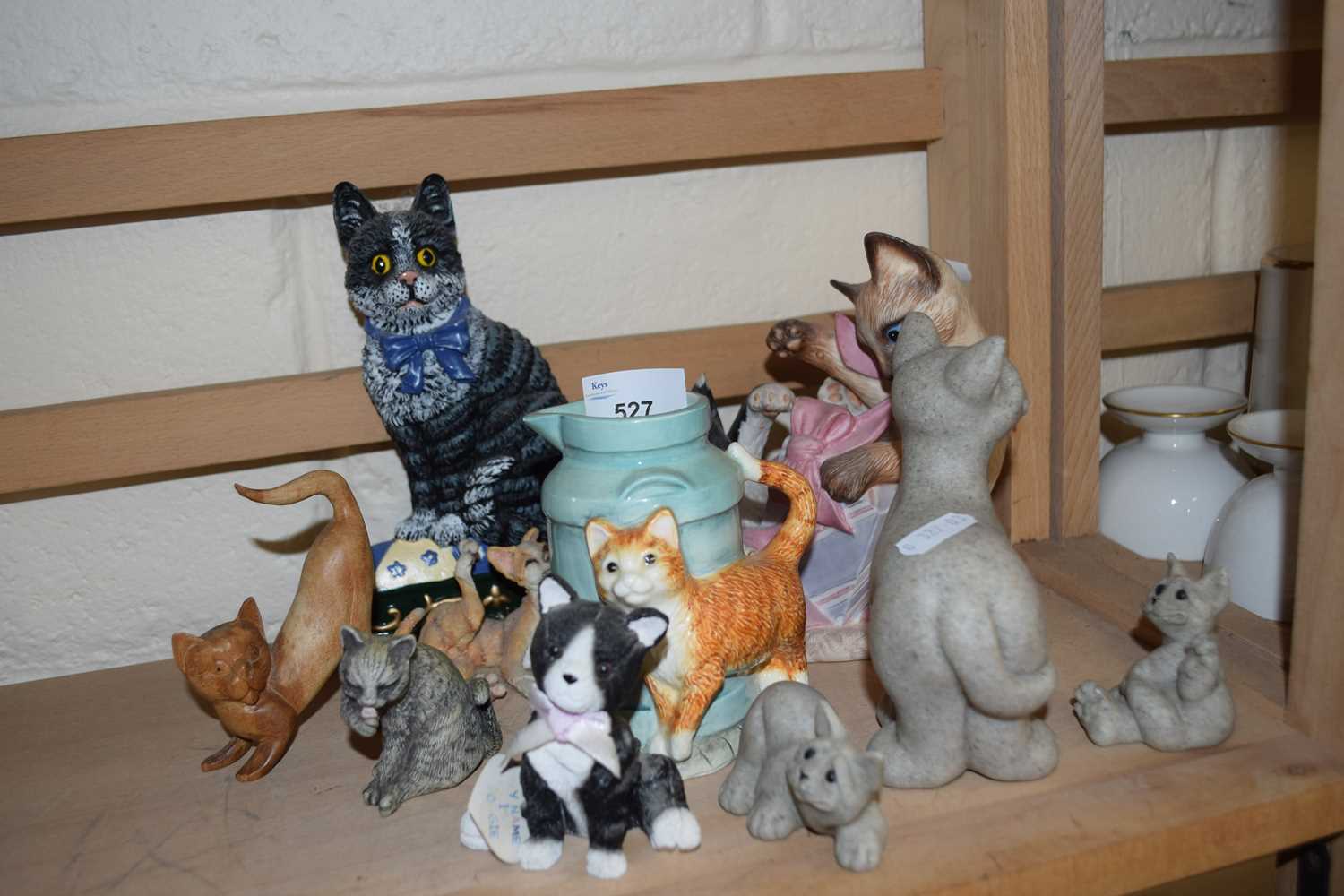 Collection of various cat ornaments