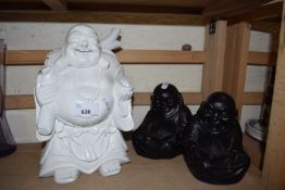 White painted carved wooden Buddha together with two resin Buddha book ends