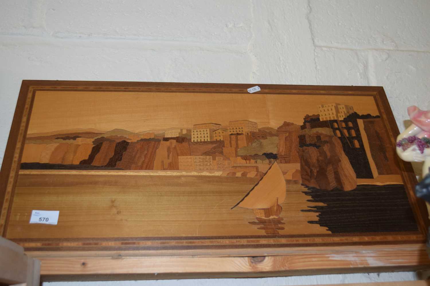 A modern marquetry picture of a seaside town