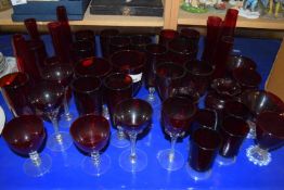 Collection of ruby and clear glass drinking glasses, vases etc