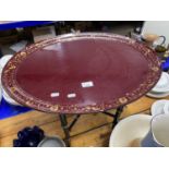 Lacquered oval serving tray and stand by Raynham Workshops, Fakenham, Norfolk, 53cm wide