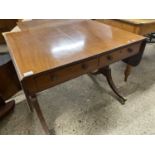 Mahogany two drawer sofa table raised on outswept legs with brass end caps and casters, 90cm wide