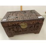 A small 20th Century Far Eastern carved camphor wood box