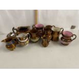 Collection of various Victorian copper lustre finish jugs and related items