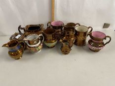 Collection of various Victorian copper lustre finish jugs and related items