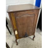 Late 19th or early 20th Century mahogany single door music cabinet on cabriole legs