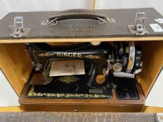 A cased Singer sewing machine