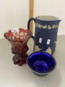 An Adams Jasper ware jug together with a bohemian cut glass goblet and a further blue glass bowl