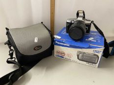 Minolta camera together with a Panasonic video camera