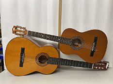 BM Spanish acoustic guitar together with an Encore acoustic guitar