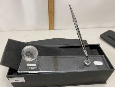 Modern glass desk stand with globe decoration