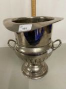A silver plated double handled urn formed wine cooler