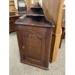 George III oak corner cabinet with single panelled door, 130cm high