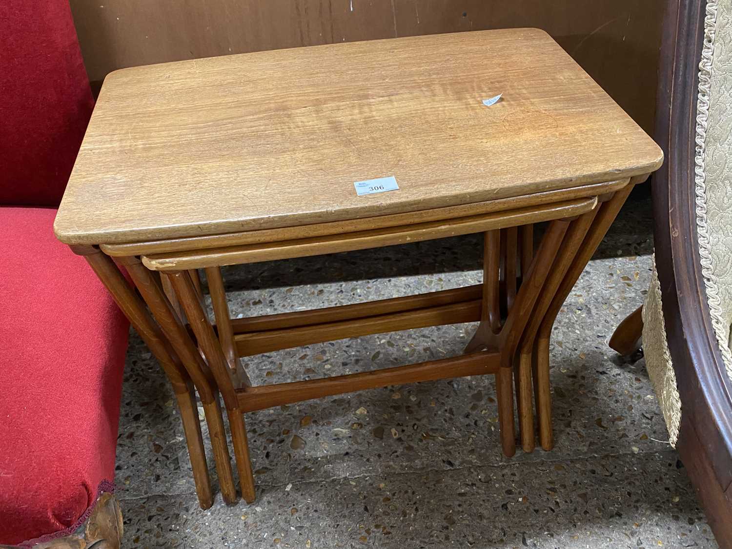 Nest of three teak tables