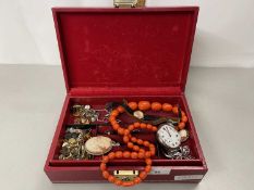 Red jewellery box containing various costume jewellery, pocket watch, wristwatch etc