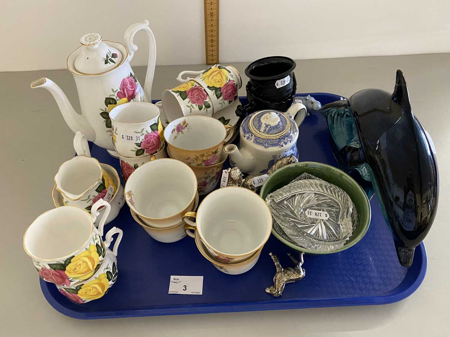 Tray of mixed wares to include Royal Albert June Delight coffee set, a Poole Pottery dolphin and