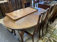 Edwardian oval extending dining table with two leaves together with a set of six Queen Anne style