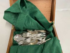 Walnut brass bound box containing assorted loose cutlery