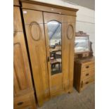 Late Victorian American walnut wardrobe with mirrored door