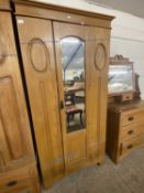 Late Victorian American walnut wardrobe with mirrored door