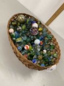 Basket of assorted marbles