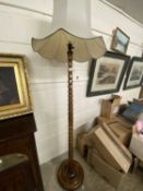 Turned wooden standard lamp