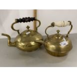 Two brass kettles