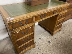 A reproduction twin pedestal office desk with green inset leather top, 125cm wide x 74cm x 61 cm