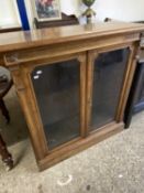 Victorian faded walnut veneered two door bookcase cabinet on plinth base,98cm wide