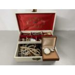 Cantilever jewellery box containing a range of various costume jewellery to include cameo brooches