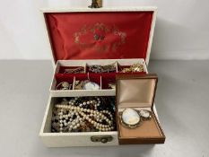 Cantilever jewellery box containing a range of various costume jewellery to include cameo brooches