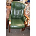 Wooden framed green upholstered easy chair