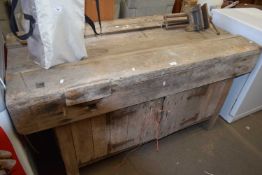 Wooden work bench and metal vice
