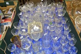 Large quantity of assorted drinking glasses to include wine glasses, port glasses, spirit measures