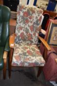 Upholstered easy chair