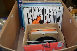 Quantity of assorted LP's and singles to include Michael Jackson, Chuck Berry and others
