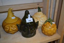 Four novelty storage jars