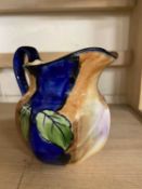 A Tunstall small jug with the printed fruit design