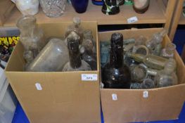 Two boxes of vintage glass bottles