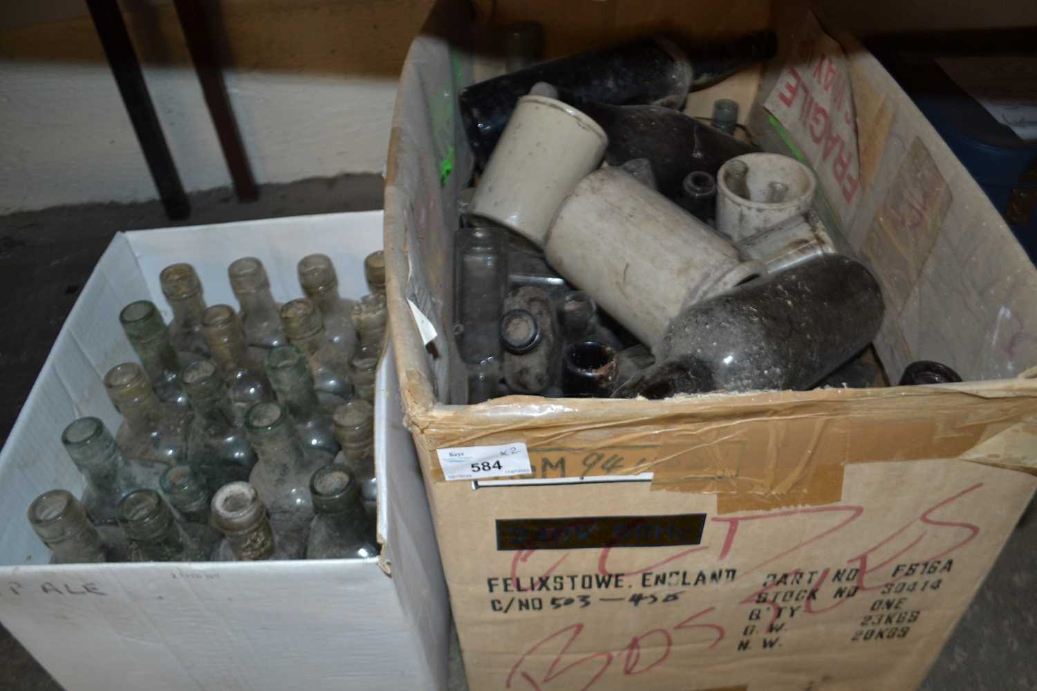 Two boxes of vintage glass bottles