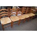Set of six pine and rush seated kitchen chairs