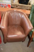 Brown faux leather tub chair