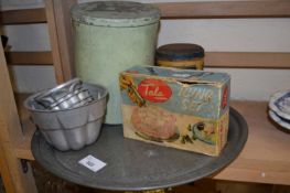 Pewter serving tray together with a quantity of aluminium jelly moulds, vintage tins etc