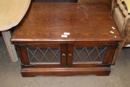 Coffee table cupboard with glazed doors