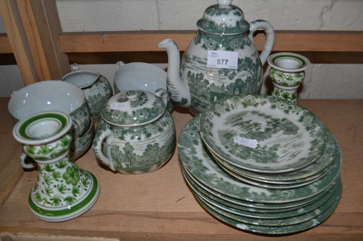 Quantity of green and white Japanese tea wares and a pair of similar dwarf candlesticks