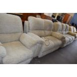 Beige textured chenille three piece suite consisting of three seater sofa, two seaater sofa and an