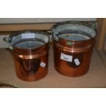 Two small copper buckets